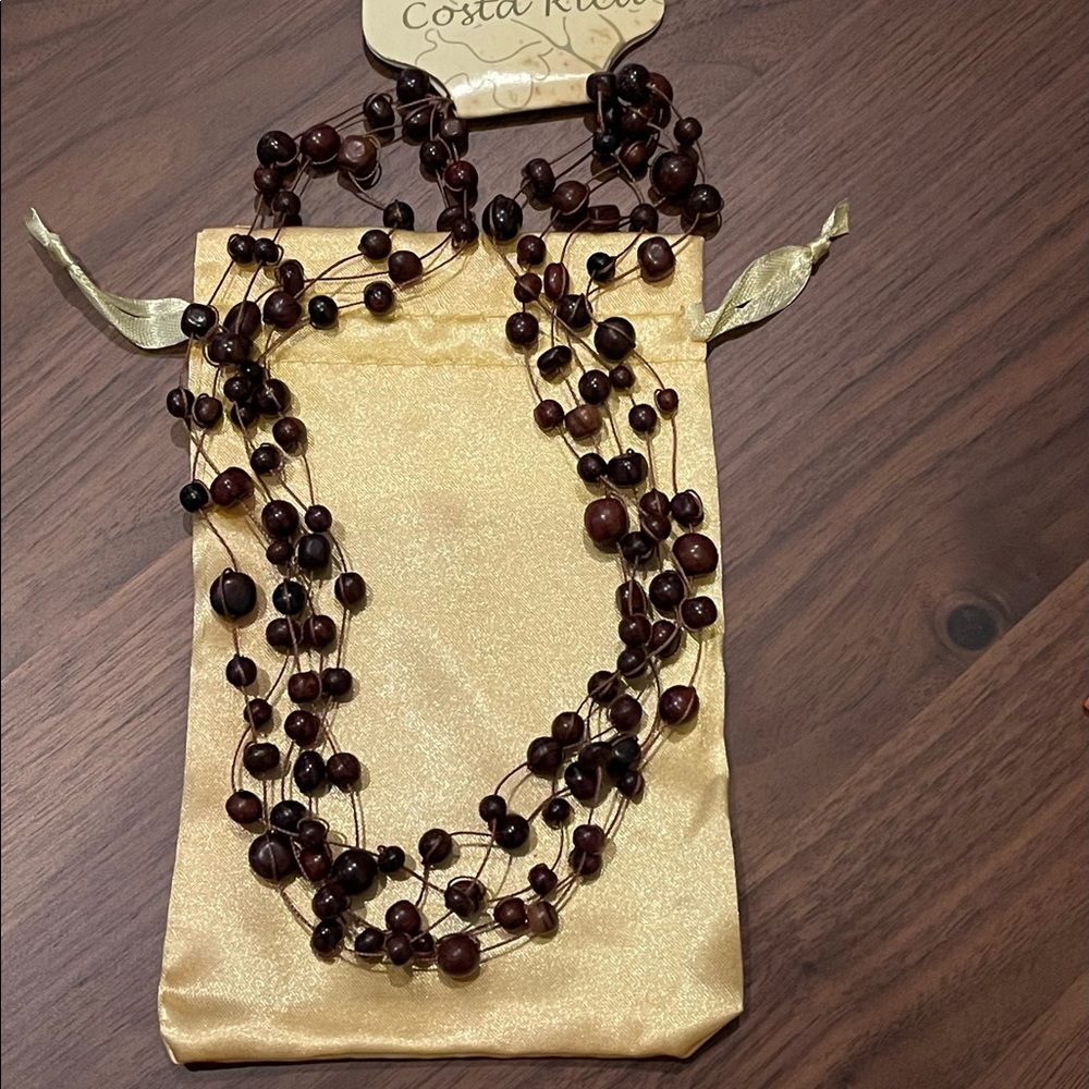 Exotic 5-strand wooden bead necklace from Costa Rica, with gold drawstring bag